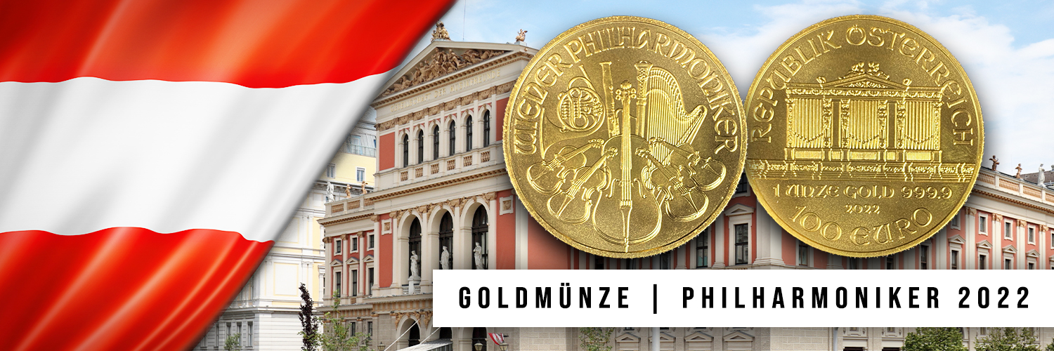 Im Hintergrund ist die Wiener Staatsoper zu sehen, links die österreichische Flagge. Im Vordergrund eine Goldmünze mit Vorder- und Rückseite: Die Vorderseite zeigt Musikinstrumente des Wiener Orchesters, die Rückseite die Orgel im 'Großen Musikvereinssaal', auch 'Goldener Saal' genannt. Unten rechts steht der Schriftzug 'Goldmünze | Philharmoniker 2022'.